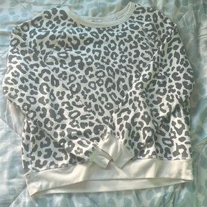 Crewneck Sweatshirt with dark grey cheetah print.